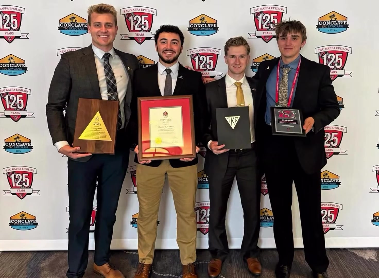 Brothers on stage accepting the Top TKE Chapter award
