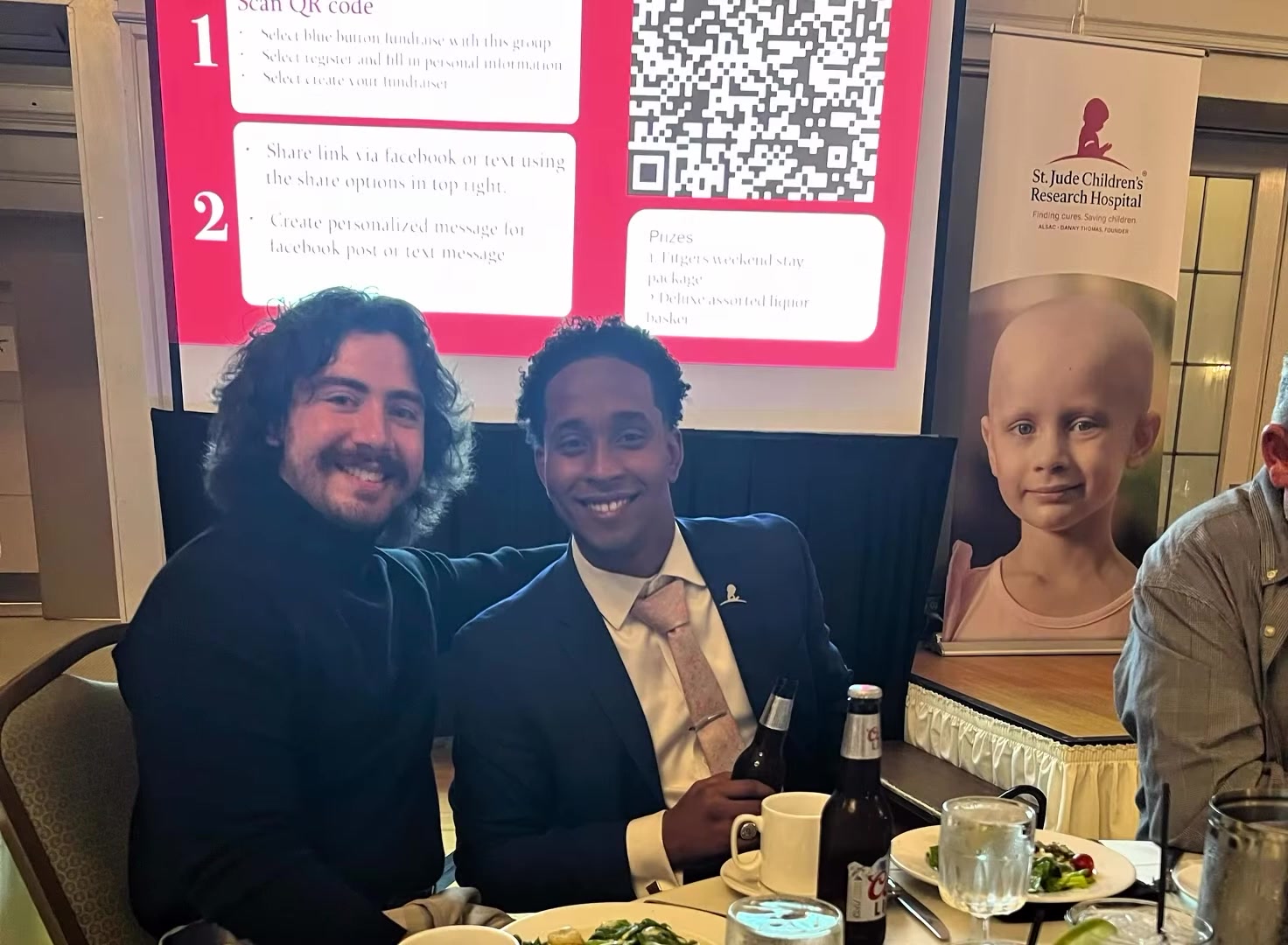 Brothers posing together at the gala