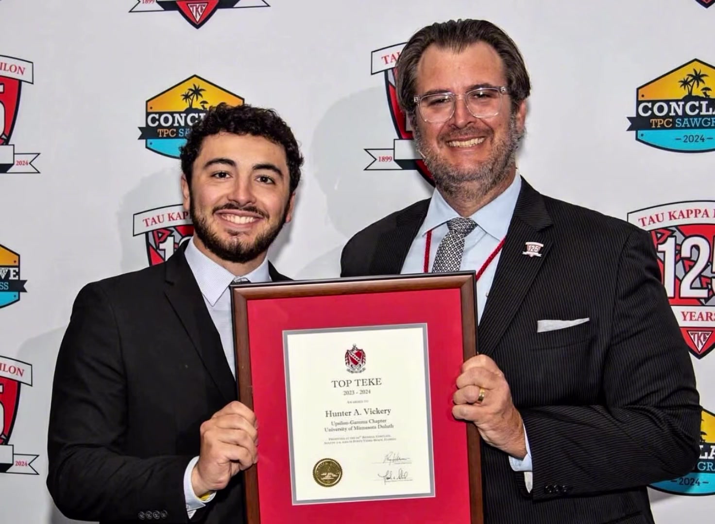Hunter Vickery receiving the Top Teke certificate at Conclave 2024